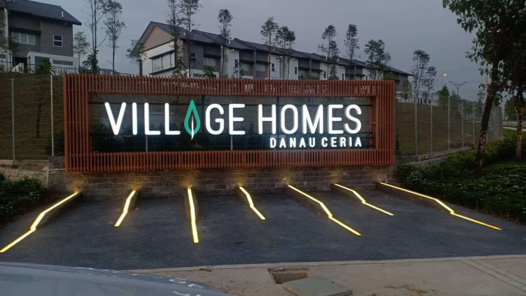 Completed illuminated signage lit at night